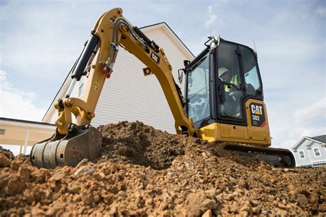 cat mini excavator bskid steer hybrid|cat mini excavator maintenance.